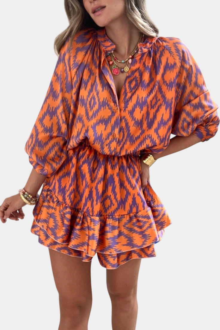 Isabel – Mono Mini Con Volantes Ikat Morado Vibrante