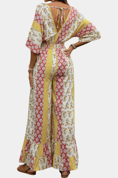 Marisol – Mono Bohemio Escote V Mangas Fluidas Cintura