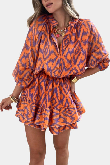 Isabel – Mono Mini Con Volantes Ikat Morado Vibrante