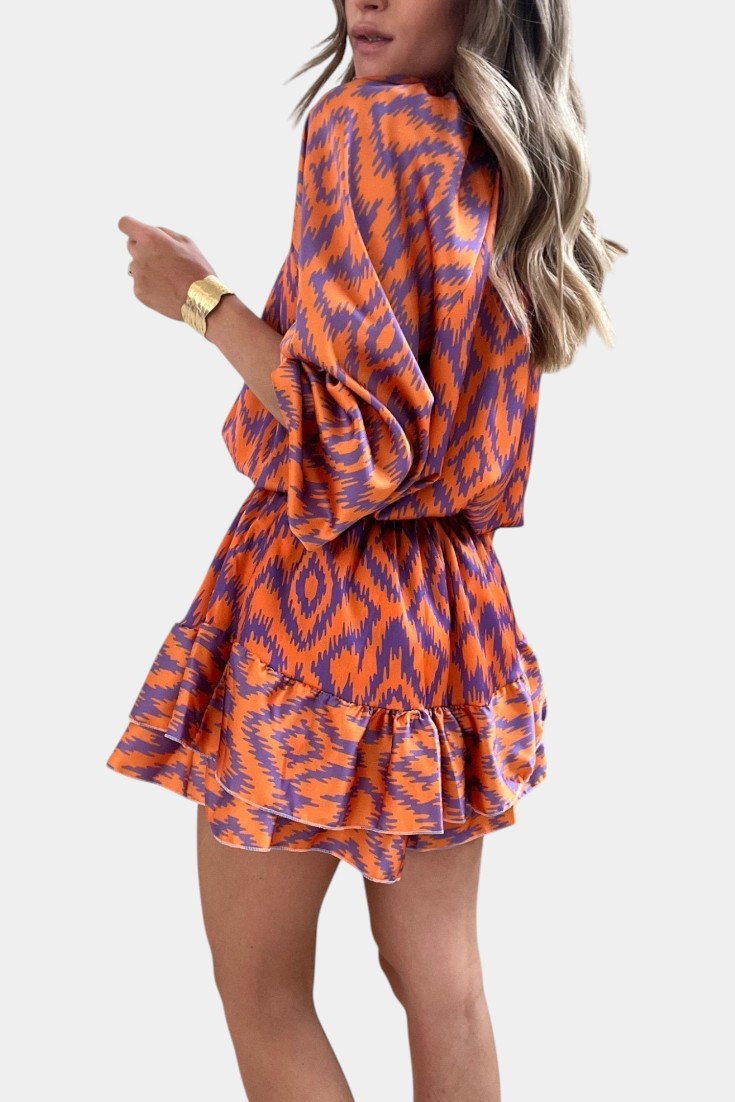 Isabel – Mono Mini Con Volantes Ikat Morado Vibrante