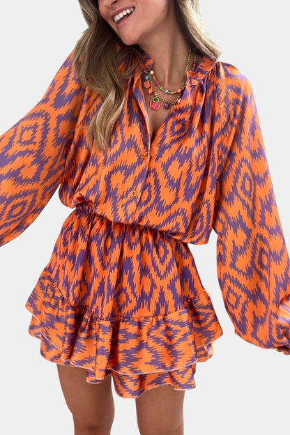 Isabel – Mono Mini Con Volantes Ikat Morado Vibrante